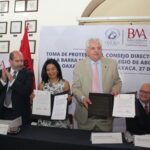 El titular del Poder judicial, magistrado Raúl Bolaños Cacho y la Presidenta  del Capítulo Oaxaca, Barra Mexicana.